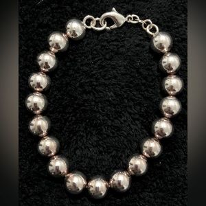 New, in box, 8” bracelet